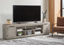 Naydell - XL TV Stand With Fireplace Option - Gray