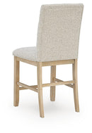 Lasinger - 5 Pc. - Counter Height Dining Table And 4 Barstools - Light Brown