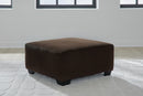 Kimlee - Sectional And Ottoman Set