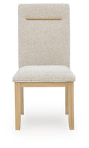Lasinger - 5 Pc. - Dining Table And 4 Upholstered Side Chairs - Light Brown