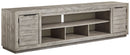 Naydell - XL TV Stand With Fireplace Option - Gray